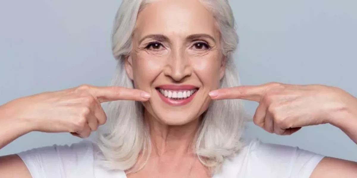 woman with smile after all-on-4 procedure